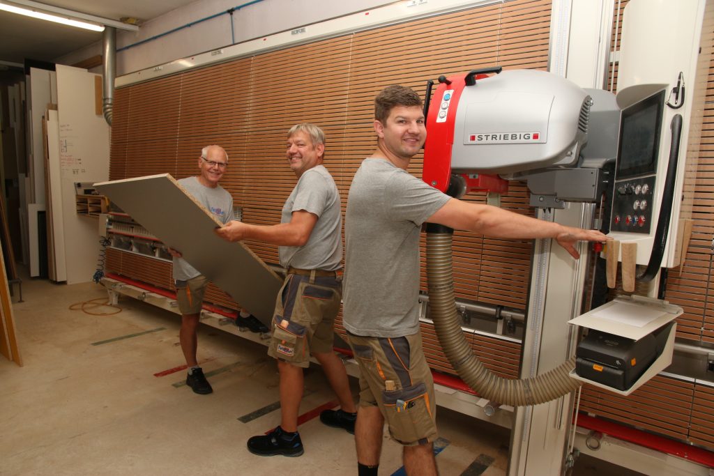 Moritz Fetscher, Thomas Fetscher und Dietmar Fetscher arbeiten gemeinsam im Betrieb.